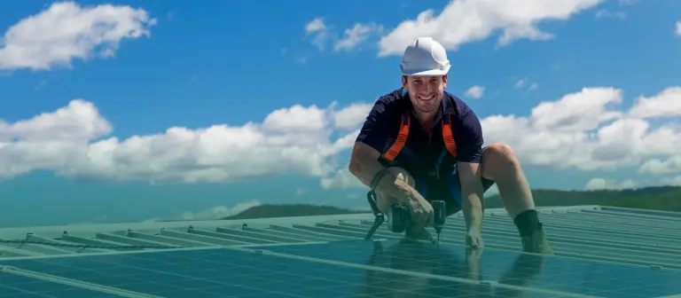 Technician installing solar panels